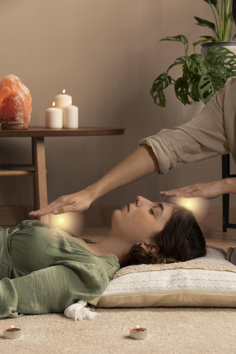 Side view therapist helping woman with healing